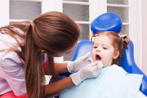 A female child being examined